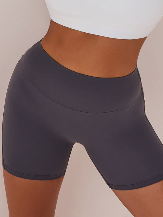 ZASUWA Female Elastic Hip Lifting Spandex Gym Cargo Booty Shorts